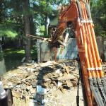 Excavator use for demolition of a Garage in North NJ